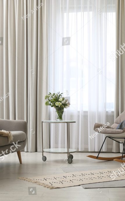 stock-photo-modern-living-room-interior-with-beautiful-curtains-on-window-1898501287