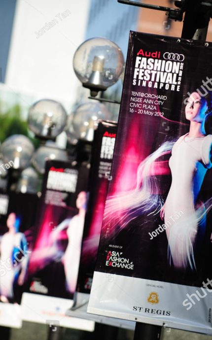 stock-photo-singapore-may-banners-along-singapore-orchard-road-to-advertise-audi-fashion-festival-on-103924064