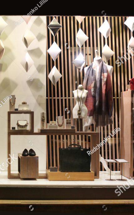 stock-photo-window-with-mannequin-and-accessories-night-light-539784607